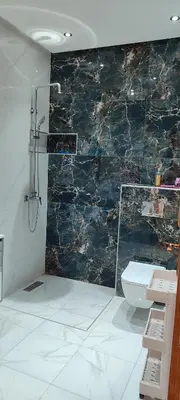 a bathroom with a shower and a sink and a toilet at مراكش تاركة in Marrakech