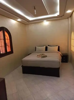 a bedroom with a large bed in a room at Marrakech-Central location 2 Bdrm in Marrakech