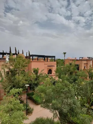 a building with trees in front of it at Atlas Golf resort in Sfiani