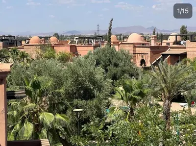 a view of a resort with trees and buildings at Atlas Golf resort in Sfiani