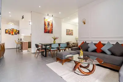 a living room with a couch and a table at Villa michlo in El Makina
