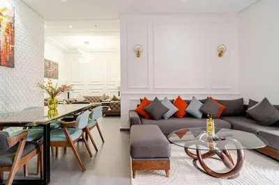 a living room with a couch and a table at Villa michlo in El Makina