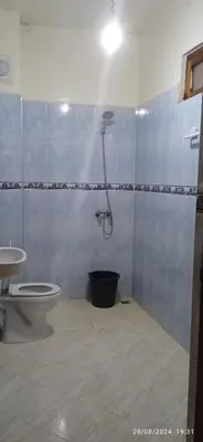 a bathroom with a shower and a toilet at Nassim 298 in Marrakech