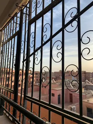 a view of a city from a window of a building at beautiful apartment in Marrakech