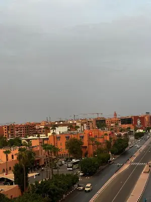 a view of a city with cars driving down a street at نور 5 كليز in Marrakech