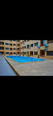 a view of a building with a swimming pool at Love studio in Marrakech