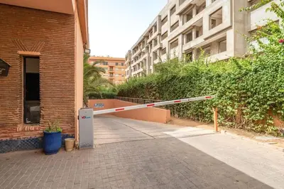a pole that is laying on the side of a building at Oasis exclusive avec piscine dans le centre-ville in Marrakech