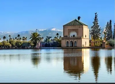 a building in the middle of a large lake at Appartement au centre de gueliz in Marrakech