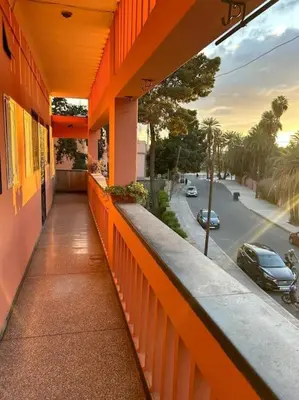 a balcony of a building with a view of a street at appartement au coeur de marrakech proche de tout in Marrakech