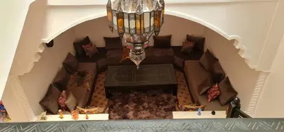 an overhead view of a staircase with a chandelier at Riad Dar Fatna in Marrakech
