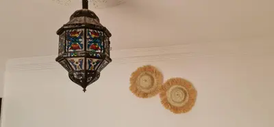 a chandelier hanging from a ceiling in a room at Riad Dar Fatna in Marrakech