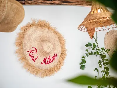 a sisalhat with the word dead island written on it at Riad Melina Au Coeur de la Medina Petit Dejeuner in Marrakech