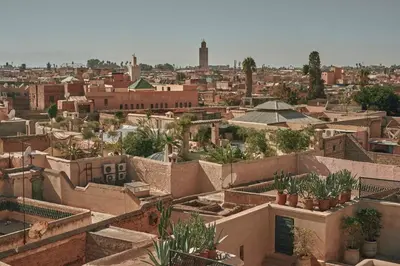 a view of a city with buildings and plants at Dar Majdoub in Marrakech