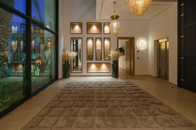 a hallway of a building with a large window at Villa Eyline Amelkis Golf in Marrakech