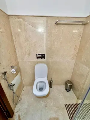 a bathroom with a toilet and a shower at Pearl Garden Studio Cosy Lux Elegant Sunny Terrace Piscine in Marrakech