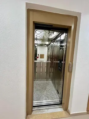 a doorway into a room with a glass door at Appartement a Gueliz in Marrakech
