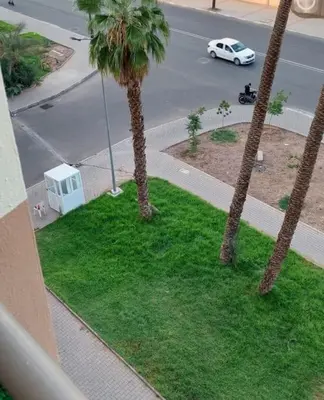 an aerial view of a street with palm trees at Marrakech Apart Macdonald Rte safi 10 min gueliz in Marrakech