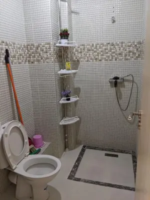 a bathroom with a toilet and a shower at Marrakech apartment in Marrakech