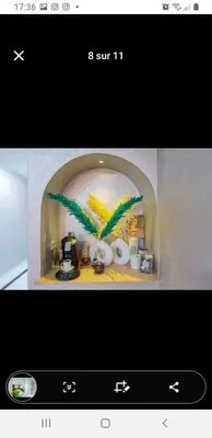 a screenshot of a website with a picture of a room at Marrakech in Marrakech