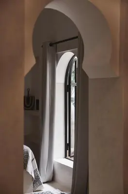 a bathroom with a shower with a mirror at Riad Soulmate in Marrakech