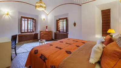 a bedroom with a large bed in a room at Villa Fairway One Amelkis in Sfiani