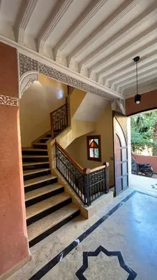 a staircase in a house with a vaulted ceiling at Villa riad al salam in Marrakech