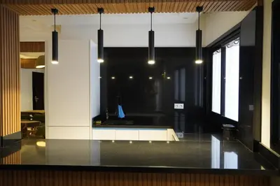 a view of a room with a table and some windows at Appartement Neuf Carré EDEN in Marrakech