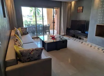 a living room with a couch and a coffee table at Luxury 2 bedroom flat Center Marrakesh in Marrakech