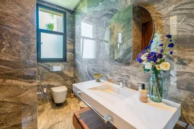a bathroom with a sink and a mirror at Villa Talia, Luxury Stay, Golf & Lake View in Marrakech