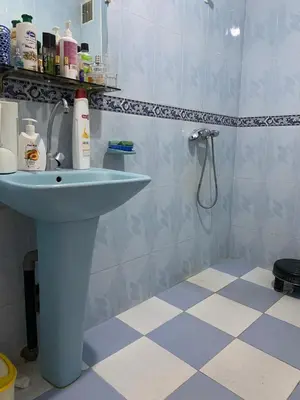 a bathroom with a sink and a shower at Apparemment Aglmous in Marrakech