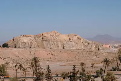a rock formation in the middle of a desert at Chic 2 Bedroom with Mountain views Gueliz in Marrakech