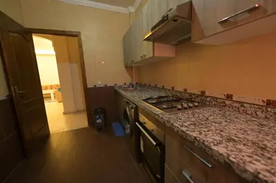 a kitchen with a stove and a counter top at Carisia Liam in Marrakech