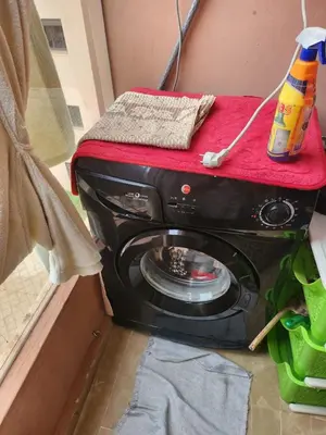 a toaster oven with a redvisor on top of it at HOURIA LOC Marrakech in Marrakech