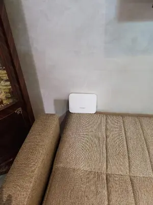 a couch with a white box on top of it at HOURIA LOC Marrakech in Marrakech