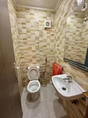a bathroom with a toilet and a sink at 2B Flat City Center Marrakech in Marrakech