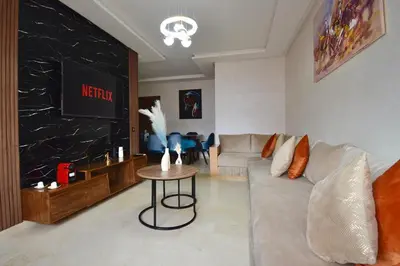 a living room with a couch and a table at apart in the centre of marrakech gueliz in Marrakech