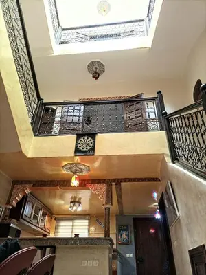 a building with a skylight and a ceiling at Riad Oued Issil in Marrakech