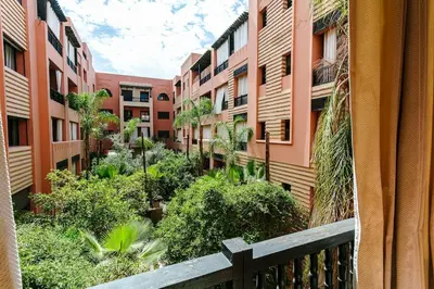a view from a balcony of an apartment building at Zen & Chic - Marrakech Downtown in Marrakech