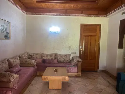 a living room with a couch and a table at Marrakech 2 in Marrakech