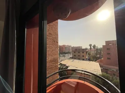 a view of a city from a window of a building at La maison Majorelle de Marrakech in Marrakech