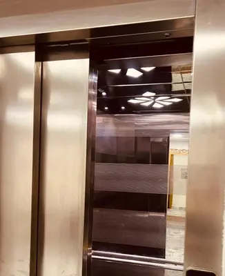 a metal elevator in a subway train at Apart Hotel Larabi in Marrakech
