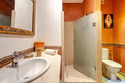a bathroom with a sink and a toilet at Cozy Studio in city center Guéliz in Marrakech