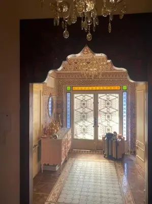 a large room with a door and a window at La porte d Or in Marrakech