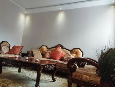 a living room with a couch and a coffee table at Tout est Nouveau et Propre,au Centre marrakech in Marrakech