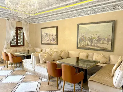 a living room with a couch and a table at Palais Mars in Marrakech