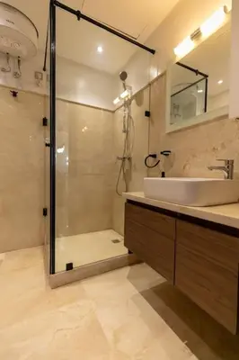 a bathroom with a shower and a sink and a shower at Bonjour cher client in Marrakech