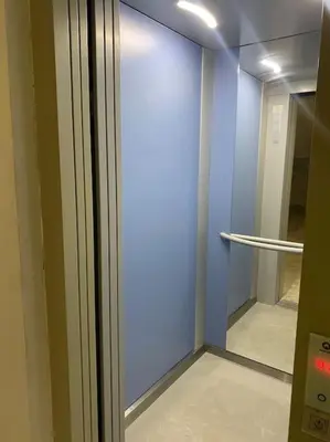 a glass door in a room with a hallway at Appartement Moderne bien équipée reservation Juste pour les familles est les couples mariés in Marrakech
