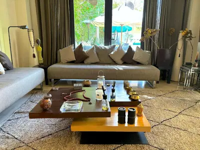 a living room with a couch and a coffee table at Palais Bali in Marrakech