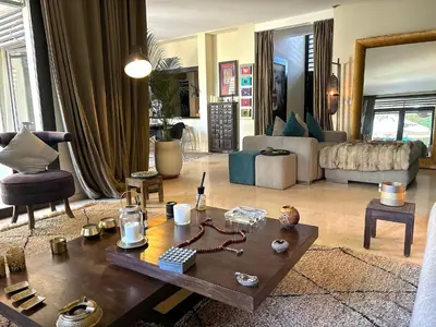 a living room with a coffee table and a couch at Palais Bali in Marrakech