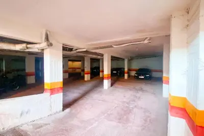an empty parking garage with cars parked in it at Appartement Riad élégant chic au cœur de Guéliz in Marrakech